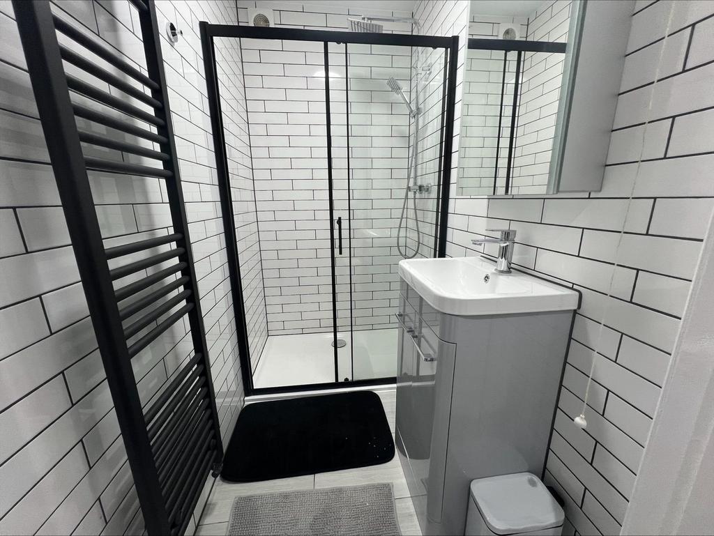 Modern and well-maintained bathroom featuring a...