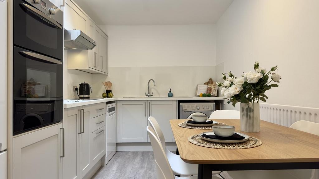 A modern and clean kitchenette perfect for stud...