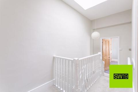 70 Boundary Road, London, SW19 2AN