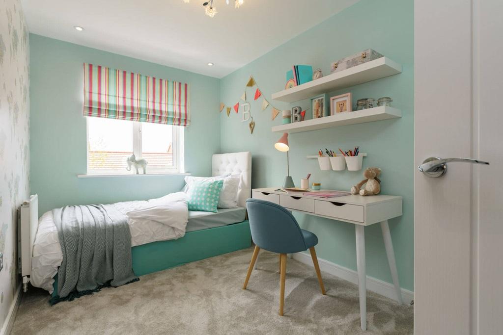 This bedroom would be ideal for a child or even...