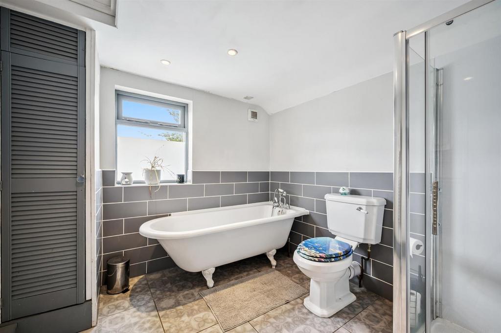 Bathroom One - bath.jpg
