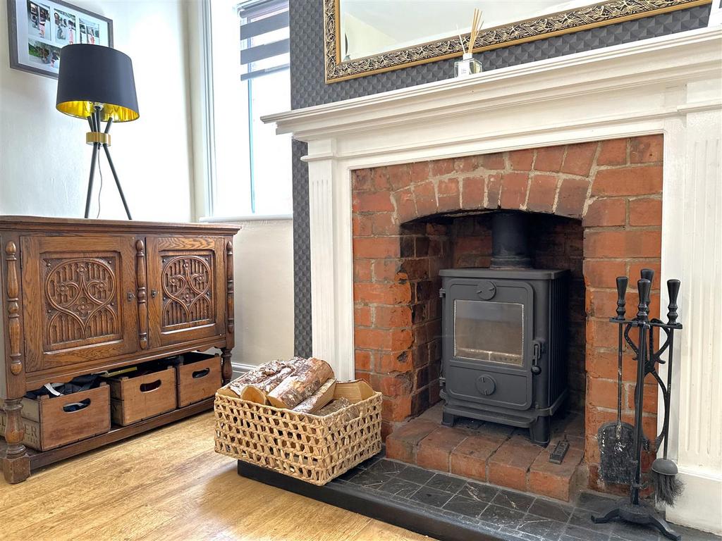 Exposed Feature Fireplace With Log Burner 920