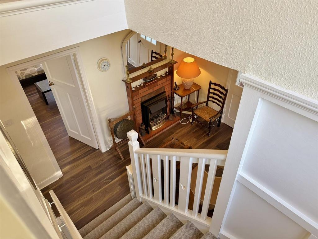 Main stairs down to entrance hallway