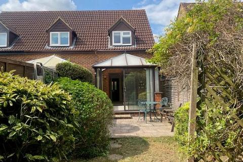 11 Chilmans Drive, Bookham, Leatherhead, KT23 4BX