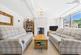 Cosy Lounge with Gas stove and large front window