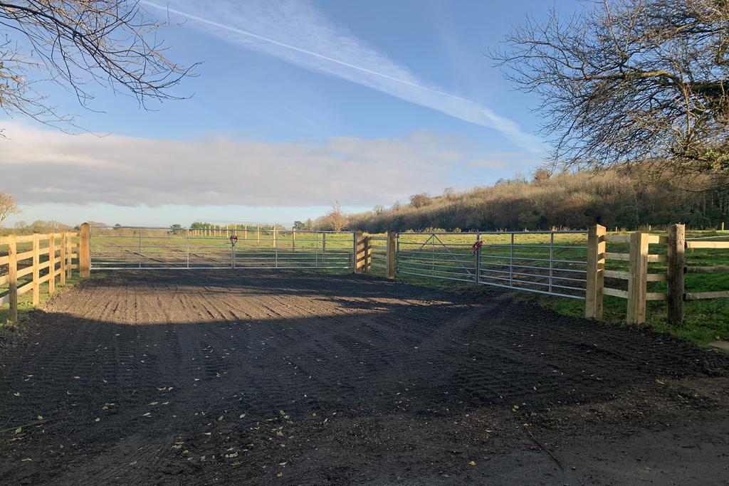 Gated access set-back from the road.