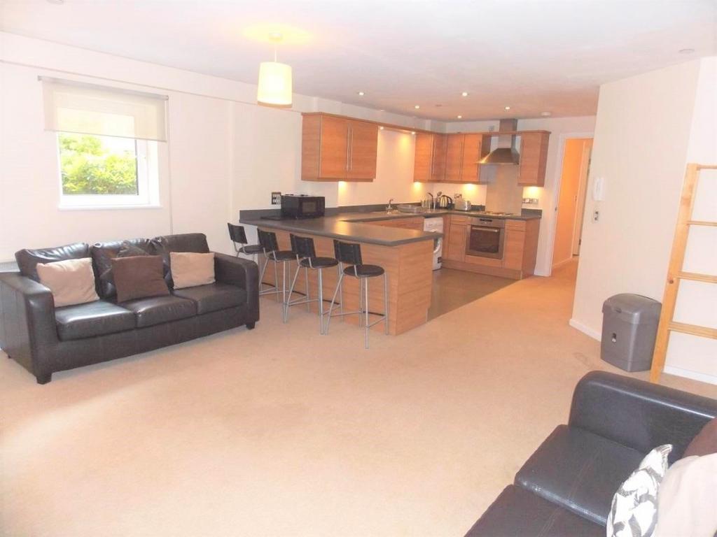A spacious, well-lit contemporary living room f...
