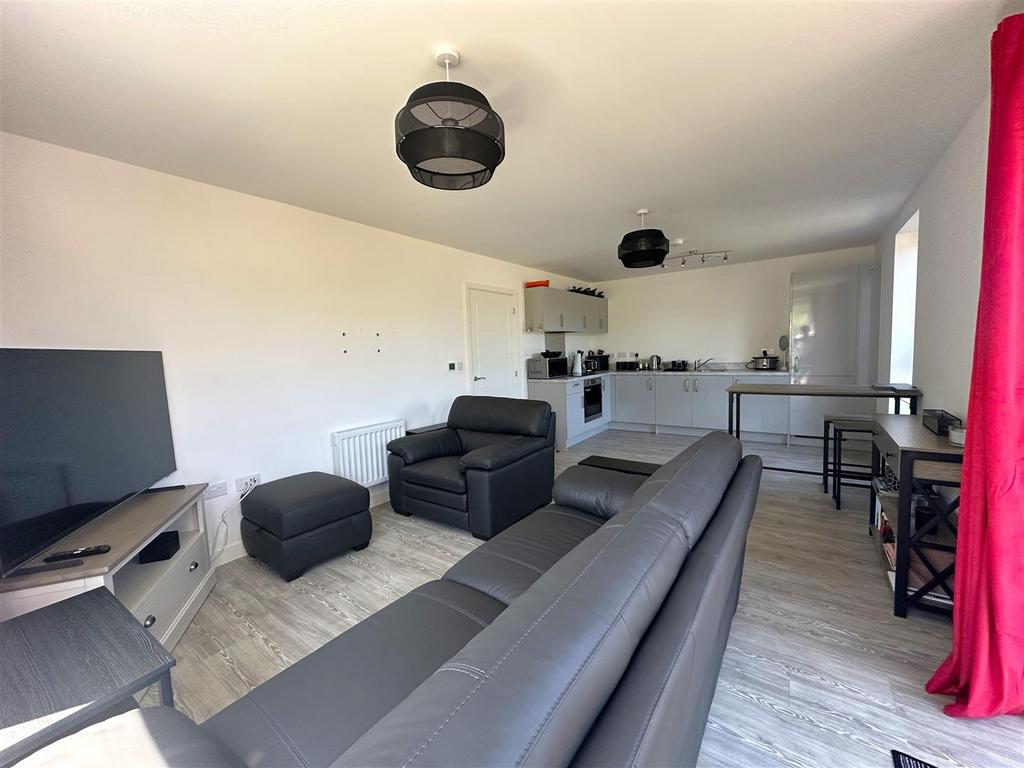 Living Room with Kitchen Area