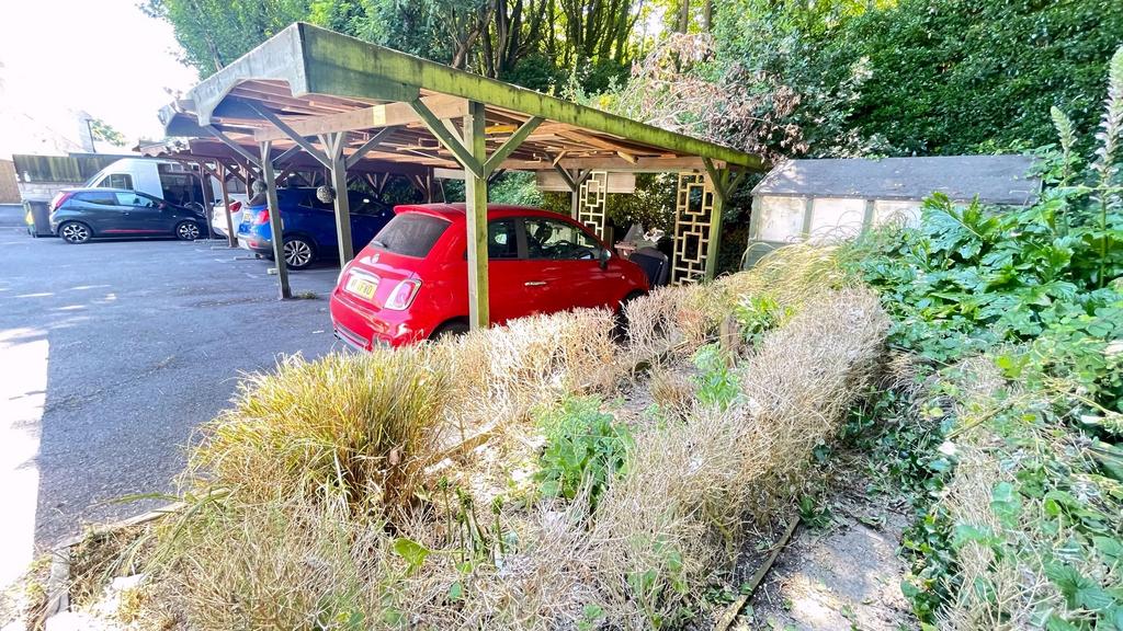 Side garden, shed and car port