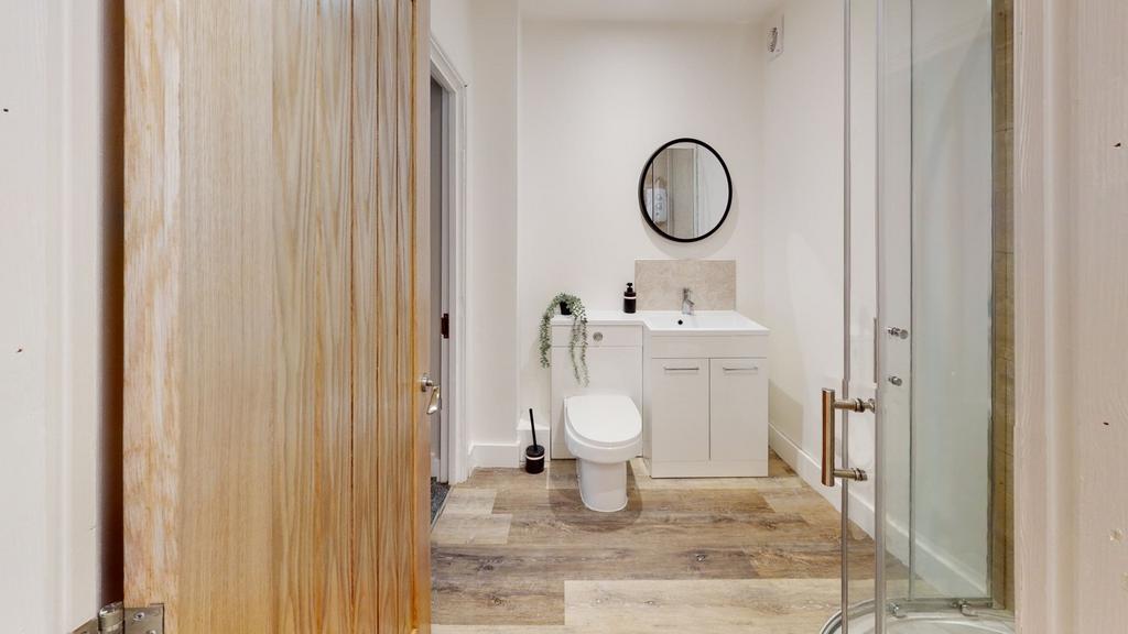A modern and clean bathroom featuring stylish f...