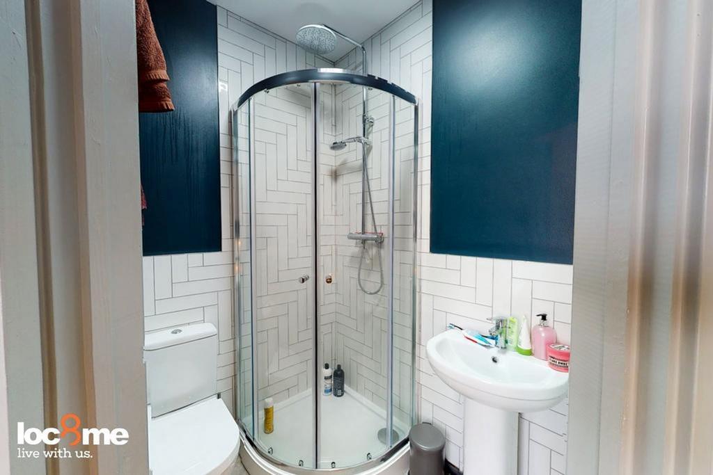 A modern and clean bathroom featuring a stylish...