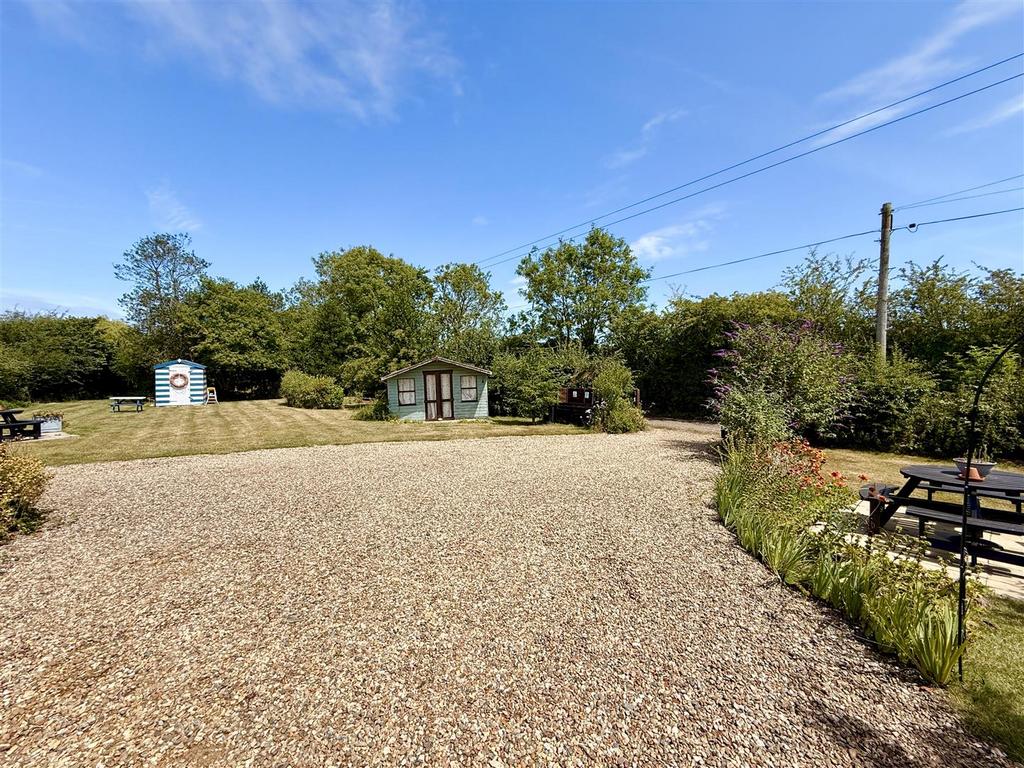 Seperate driveway serving the holiday accommodatio