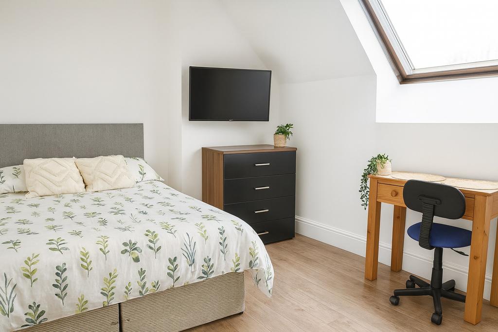 Bright and inviting master bedroom featuring a ...