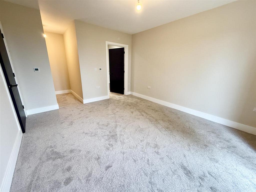 Bedroom one with dressing area