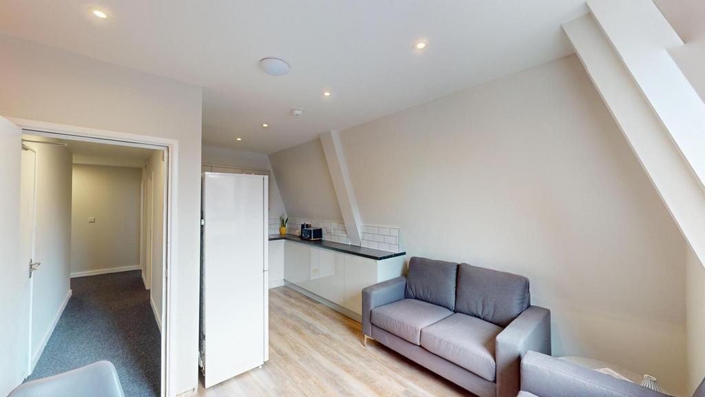 A modern and inviting living room with ample na...
