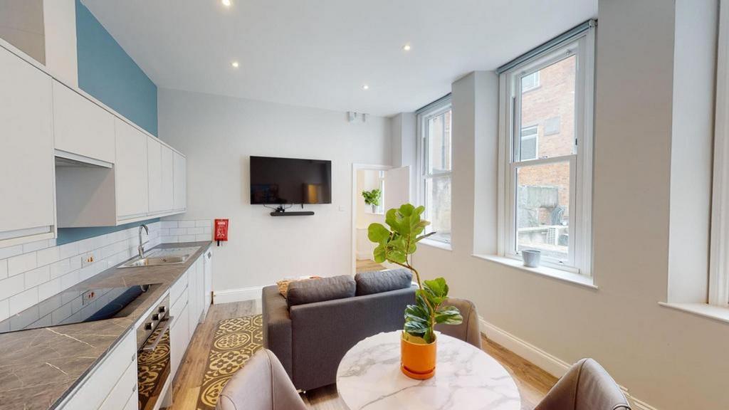 A spacious and bright modern living room perfec...