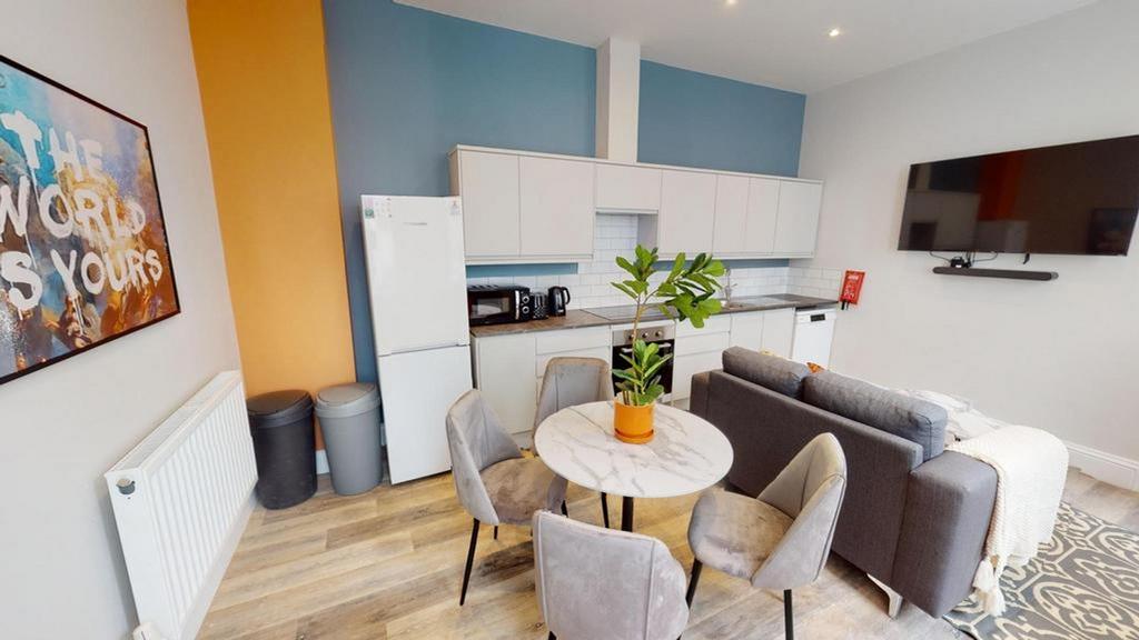 A modern kitchenette with stylish decor, perfec...