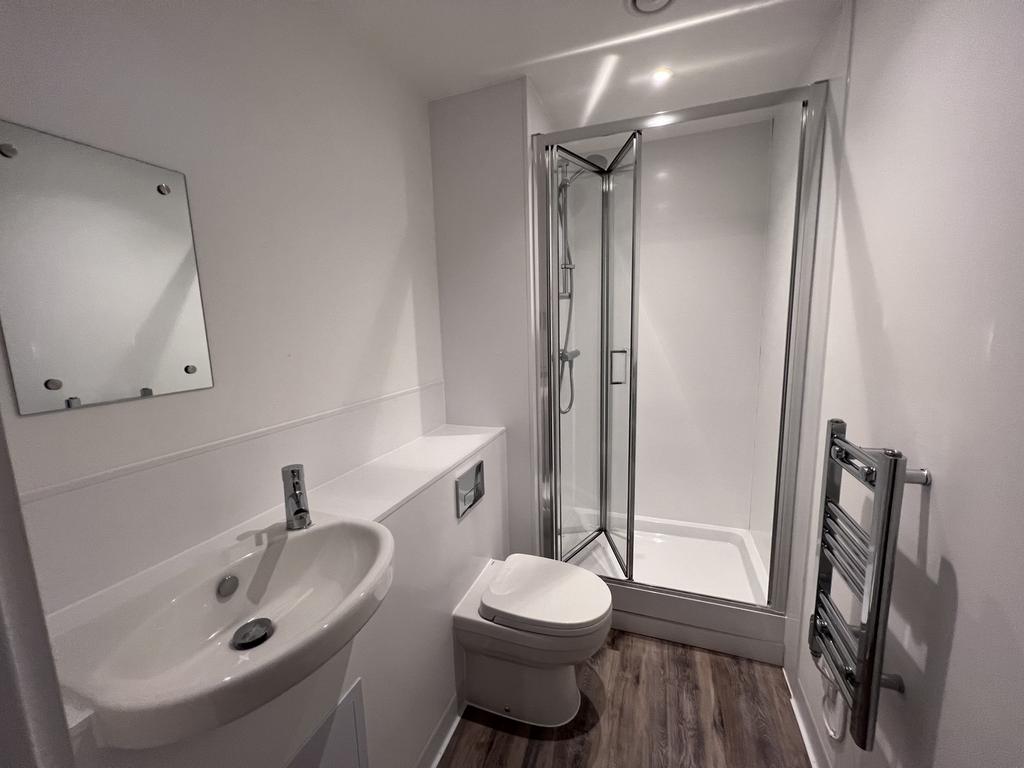 A modern and clean bathroom featuring a stylish...