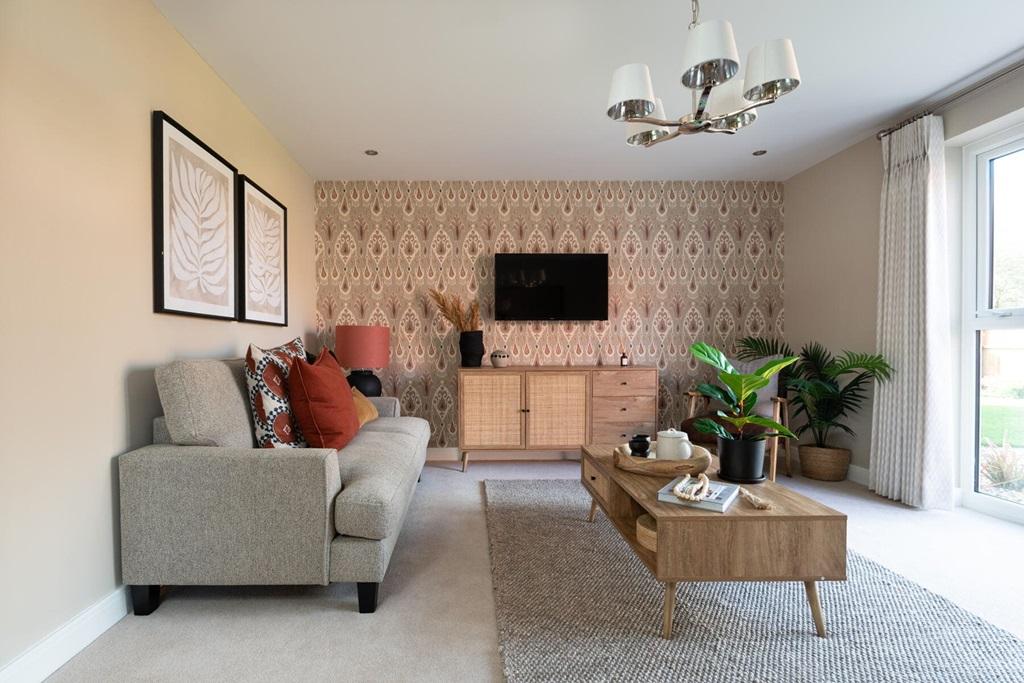 The living room features double doors to the...