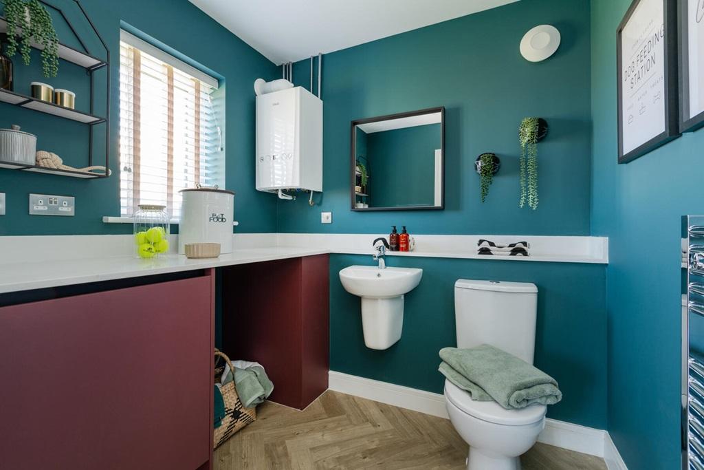 A downstairs cloakroom and utility adds...