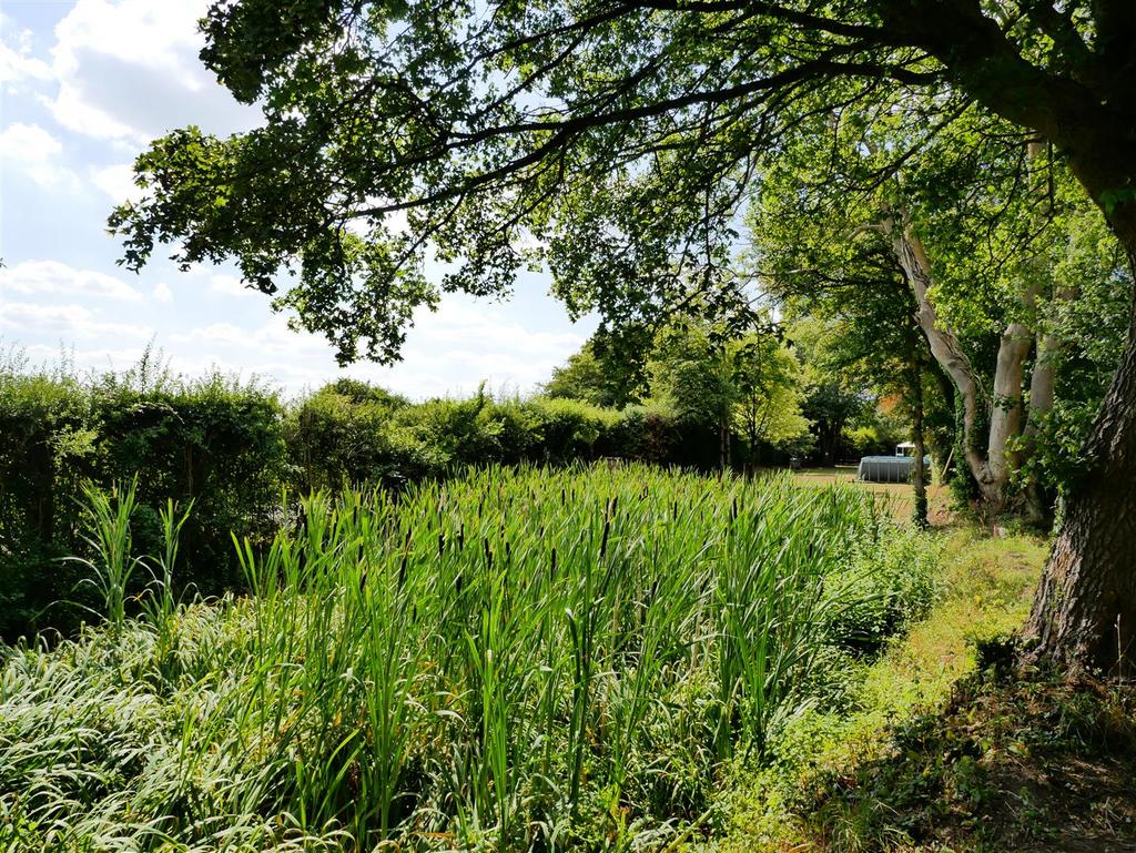 Land to the side