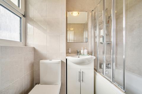 Flat 58, Greenfield House Tilford Gardens, London, SW19 6DN