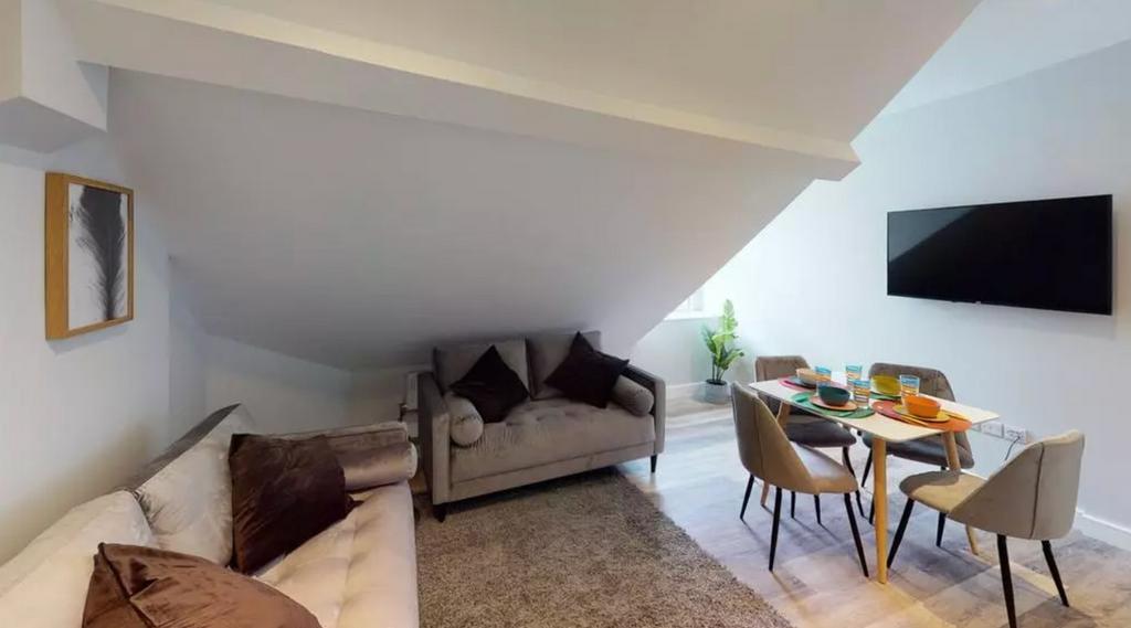 A stylish and inviting living room perfect for ...