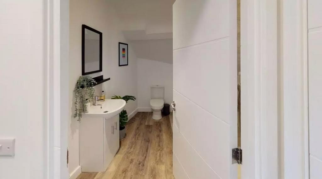 A modern and clean bathroom featuring stylish f...