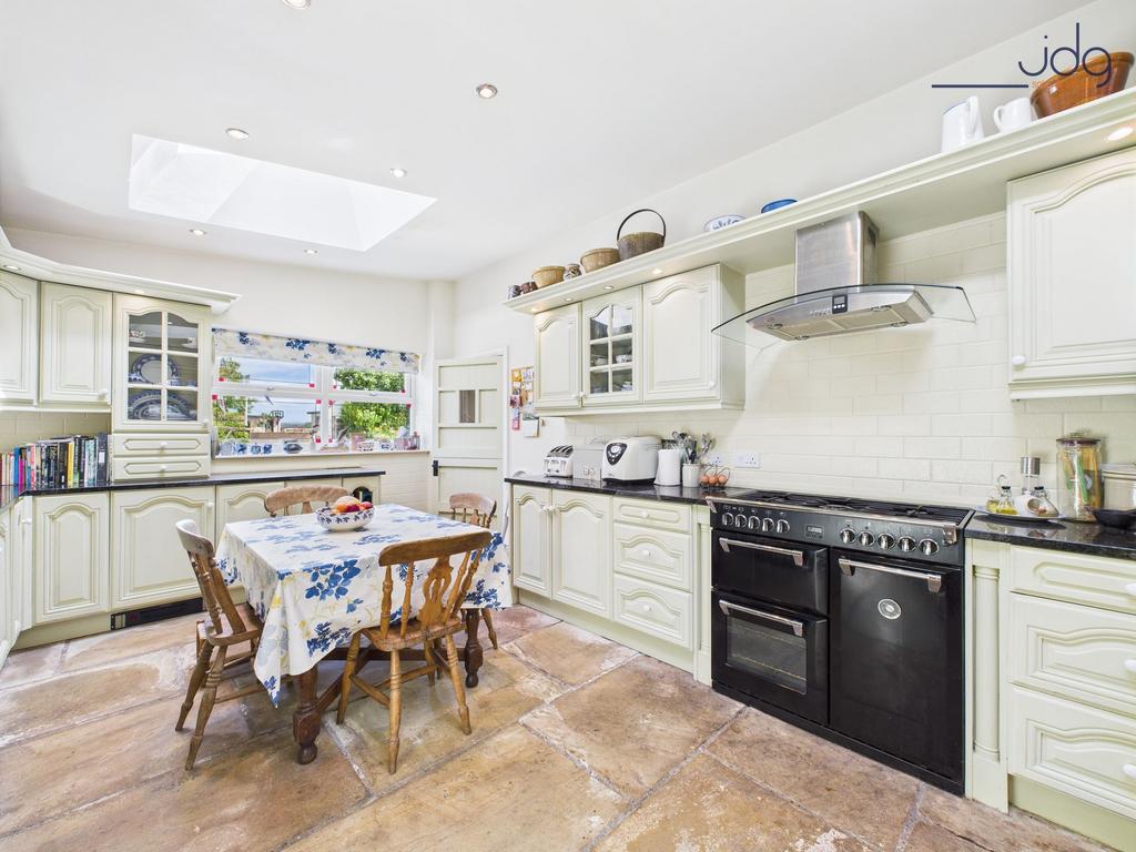 Kitchen with dining space and skylight