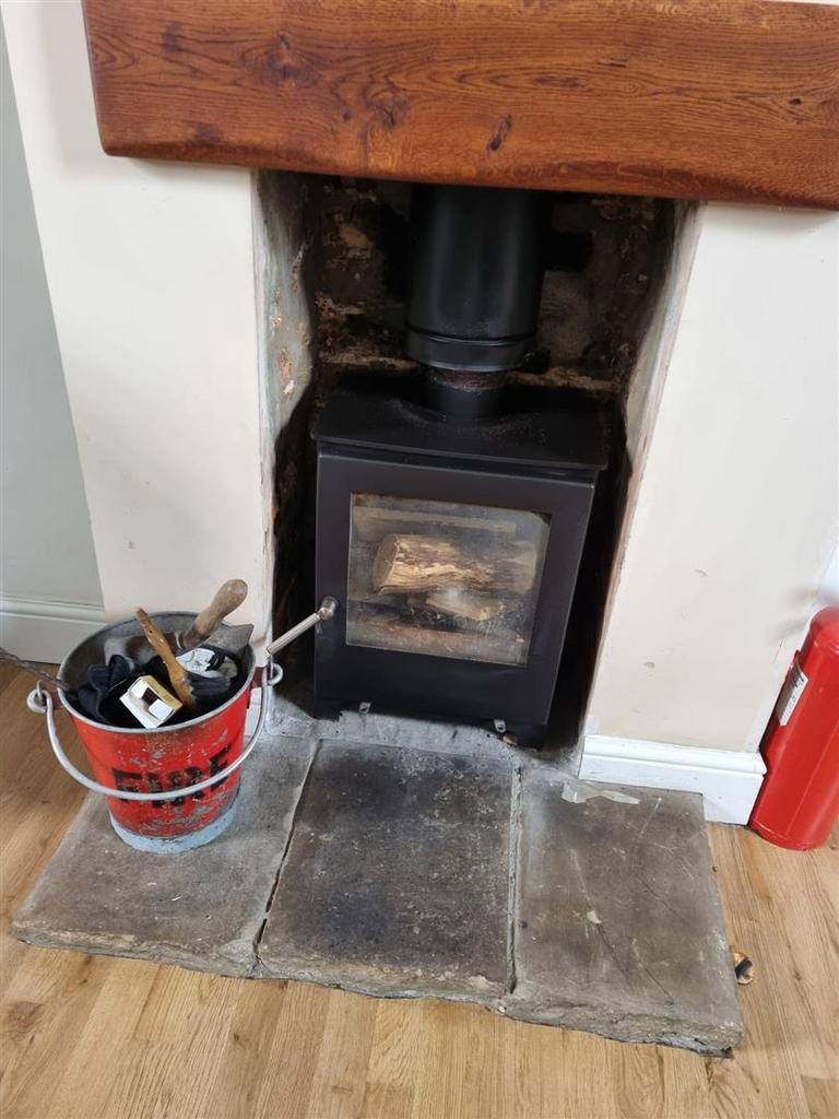 Log burner in kitchen.jpg