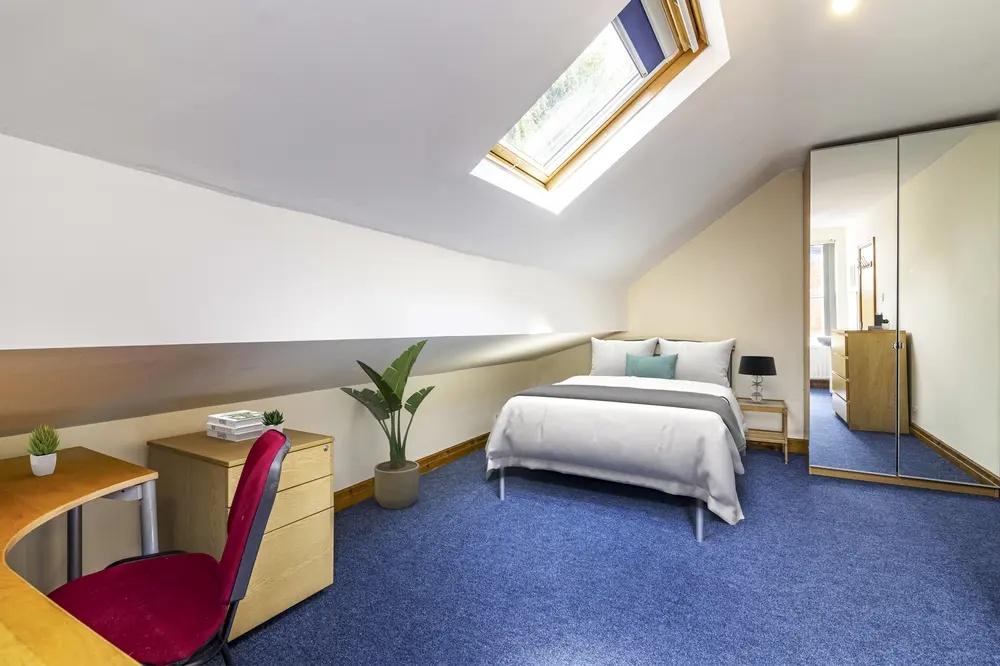 Bright and inviting double bedroom featuring a ...