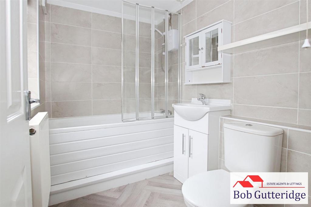 Ground floor fully tiled bathroom