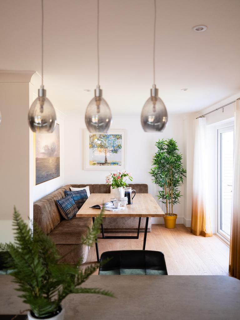 Open plan dining space with patio doors