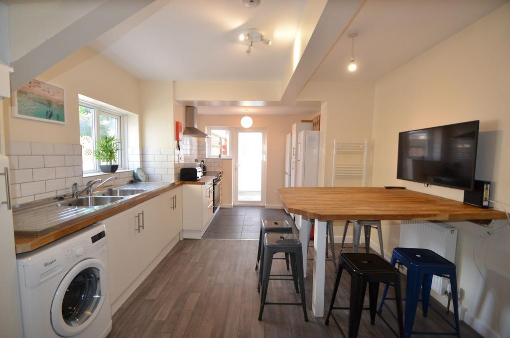 Bright and spacious kitchen featuring modern ap...