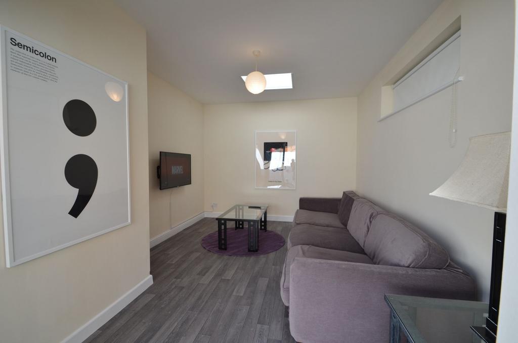 Bright and inviting living room featuring moder...