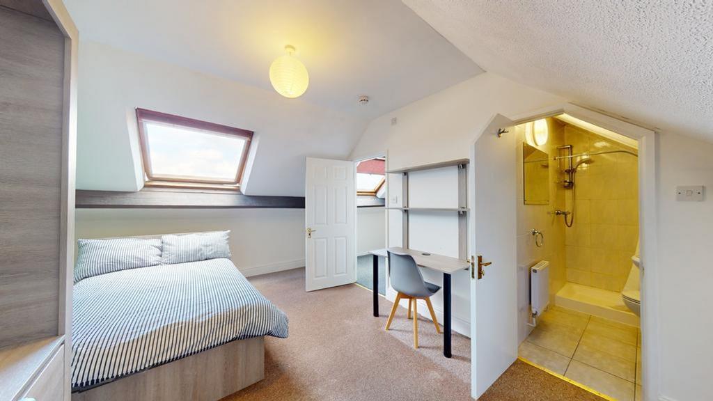 A spacious and bright large double bedroom with...