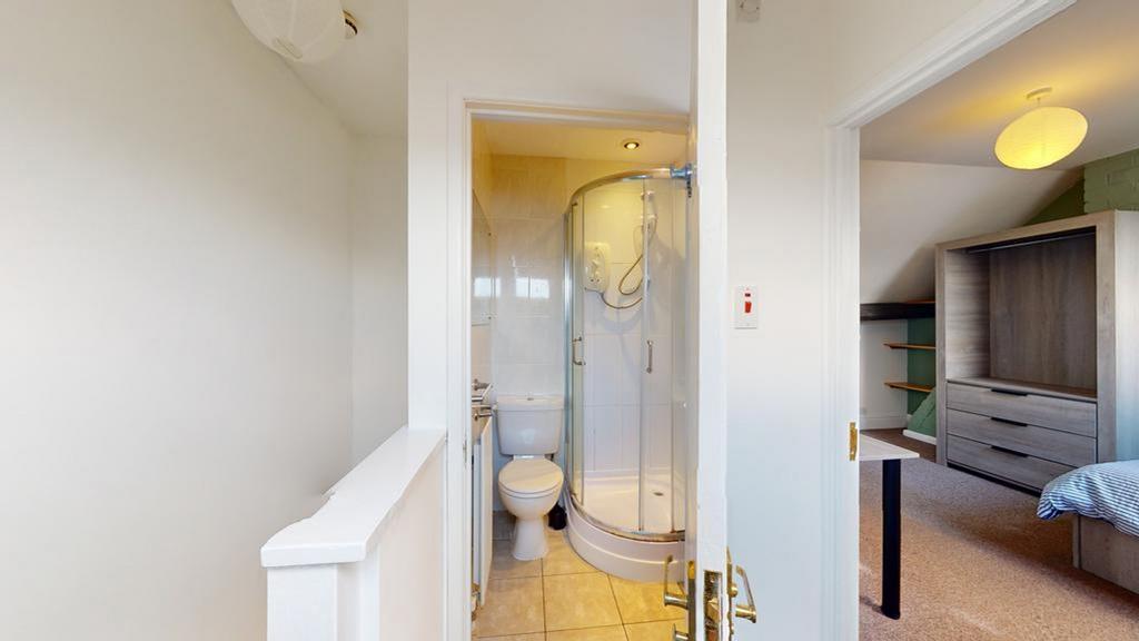 A bright and clean bathroom featuring a modern ...