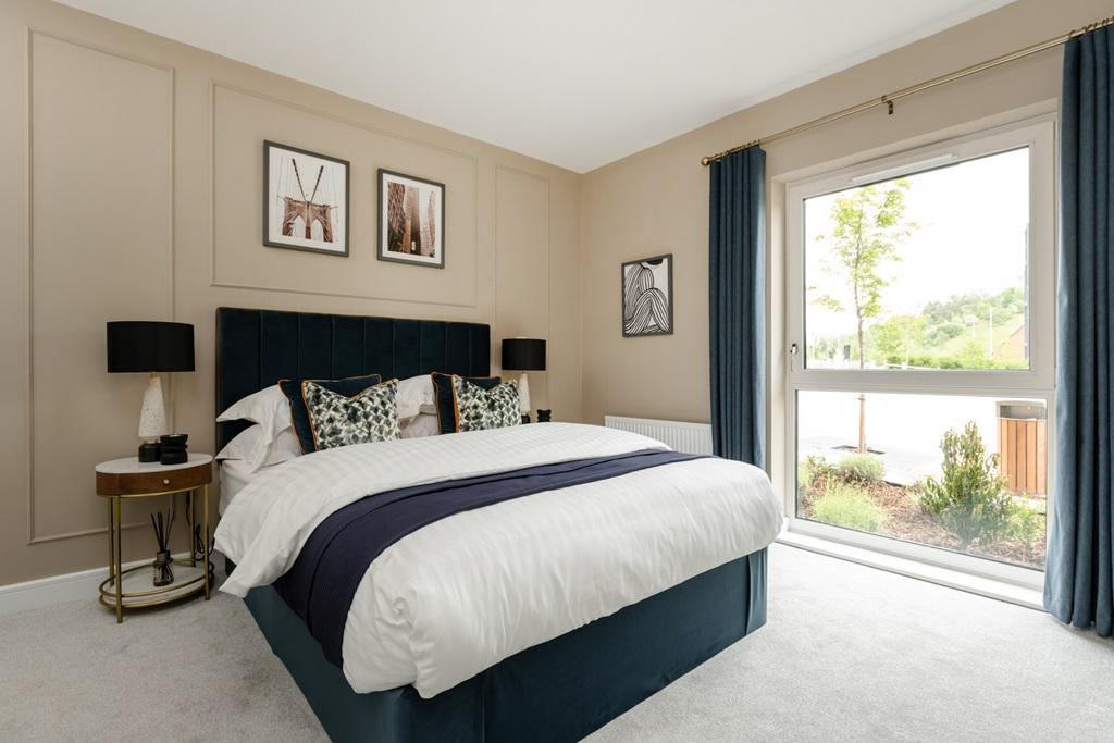 The stunning main bedroom offers plenty of...