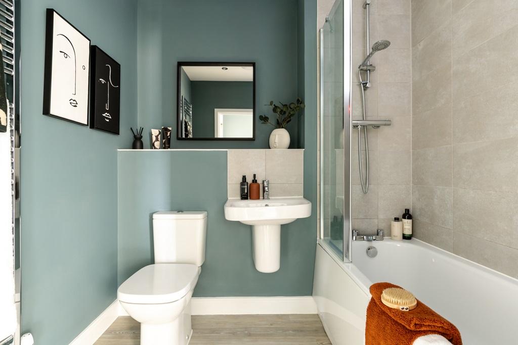 The main bathroom features  modern energy...