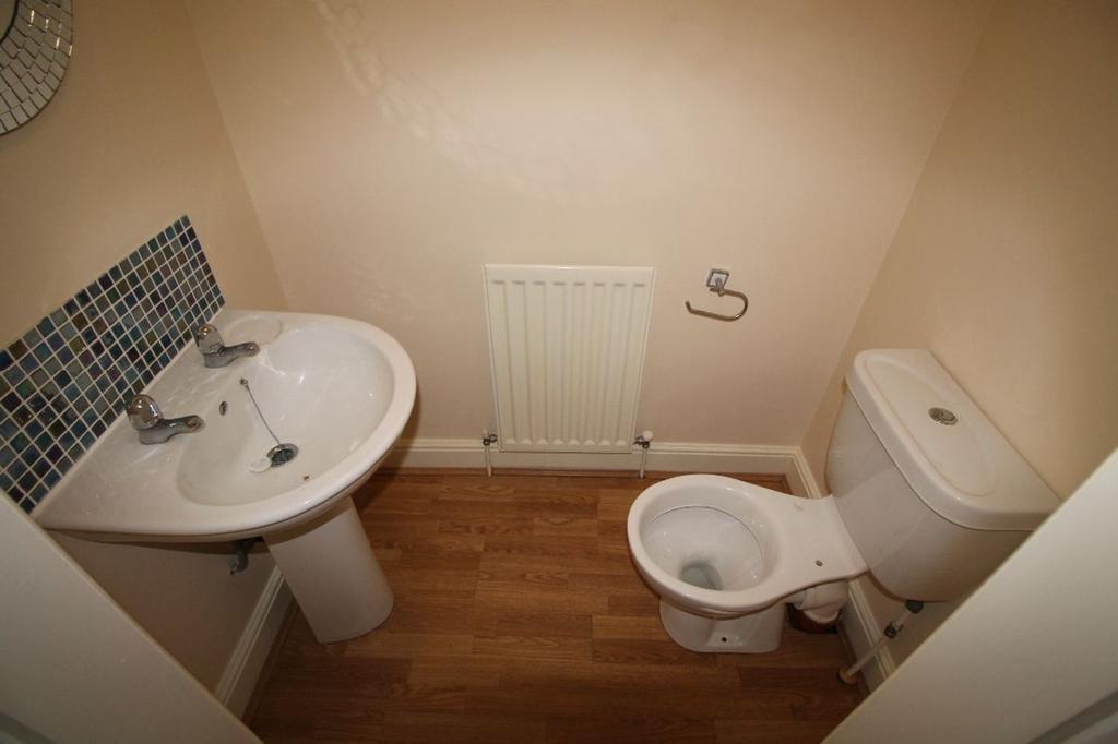 A well-maintained single toilet featuring moder...