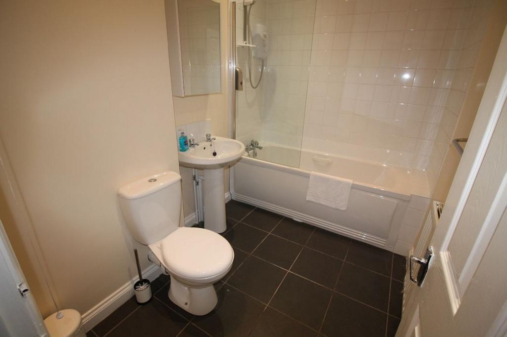 Modern bathroom suite featuring a clean design ...