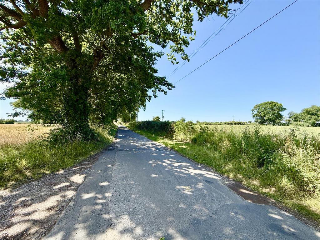 Located on a loke just off a country lane