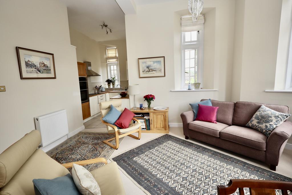 Sitting room through to kitchen