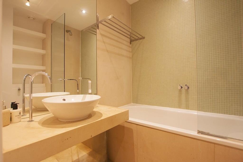BATHROOM with BASIN BOWL and MIRROR and SHELVES