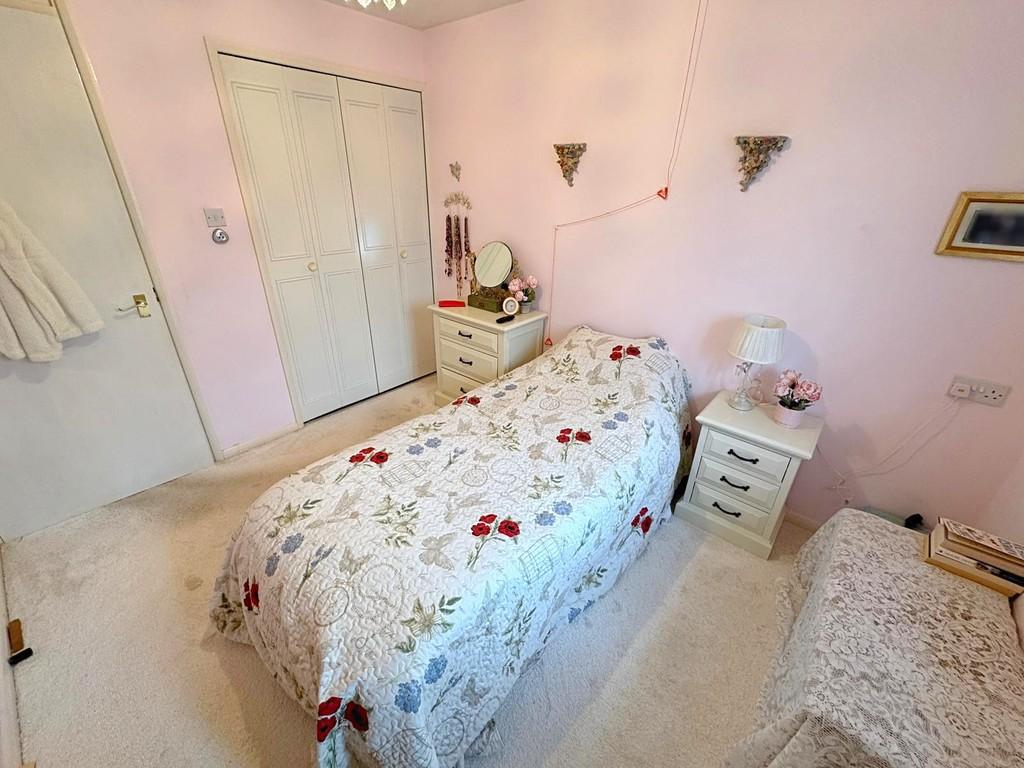Bed 1 to wardrobe