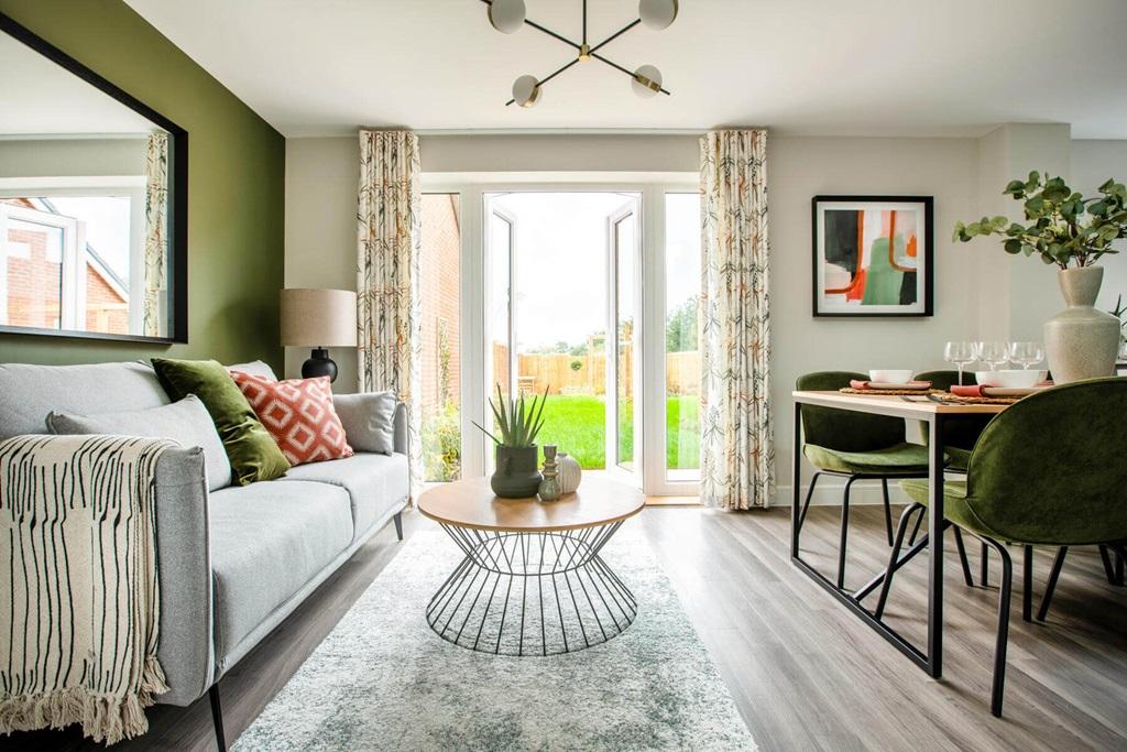 Double doors lead from the dining area to the...