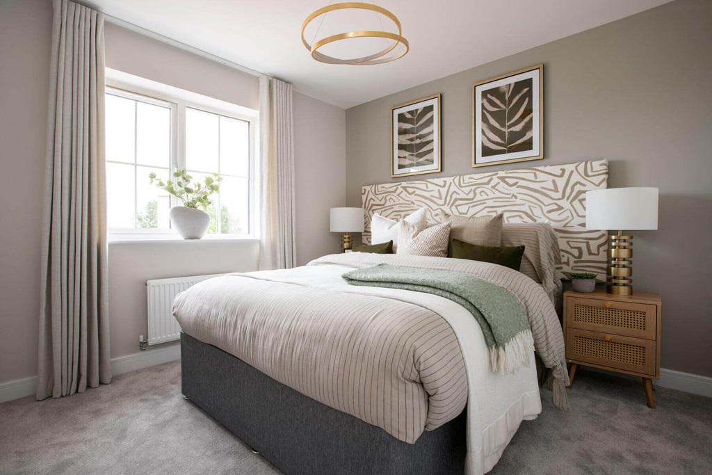 The main bedroom offers space to relax away...