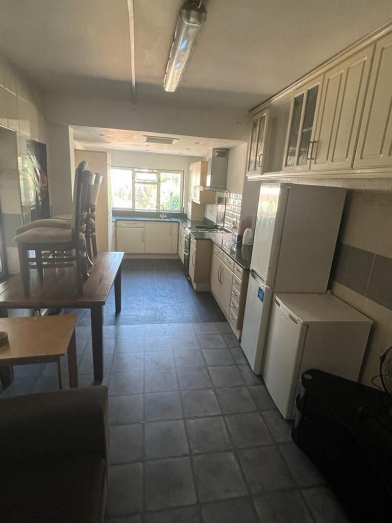 A spacious kitchen featuring ample counter spac...