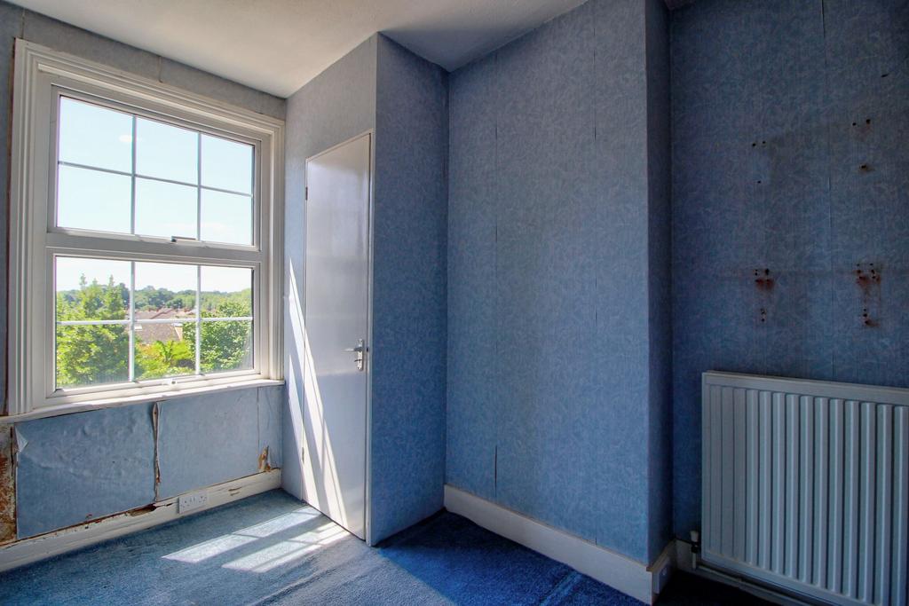 Bedroom Three with airing cupboard