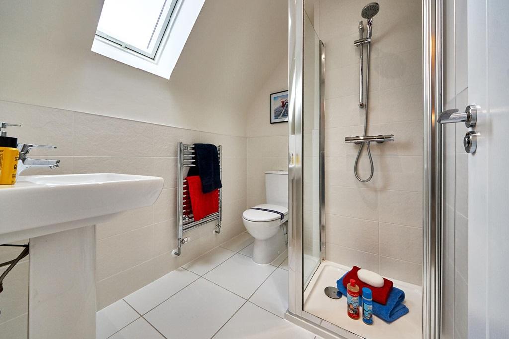 Bedrooms on the top floor have a useful shower...